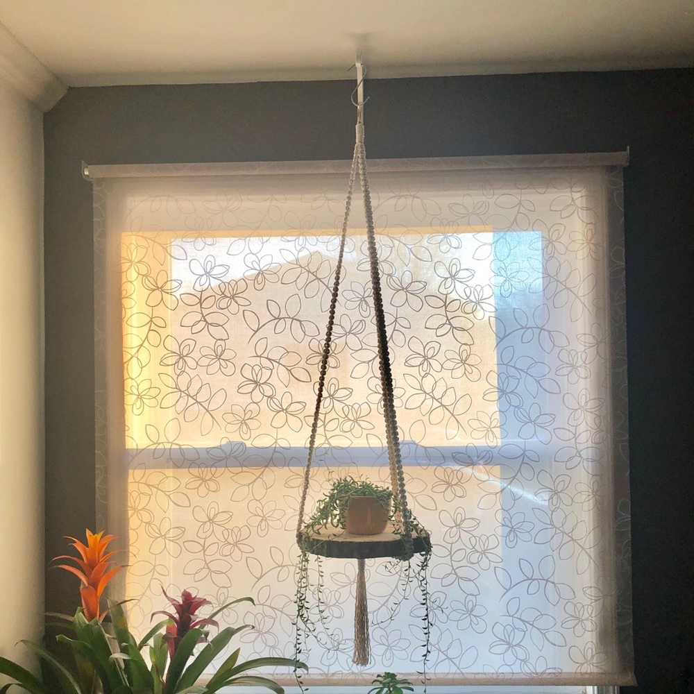 Macrame shelf with wood slab